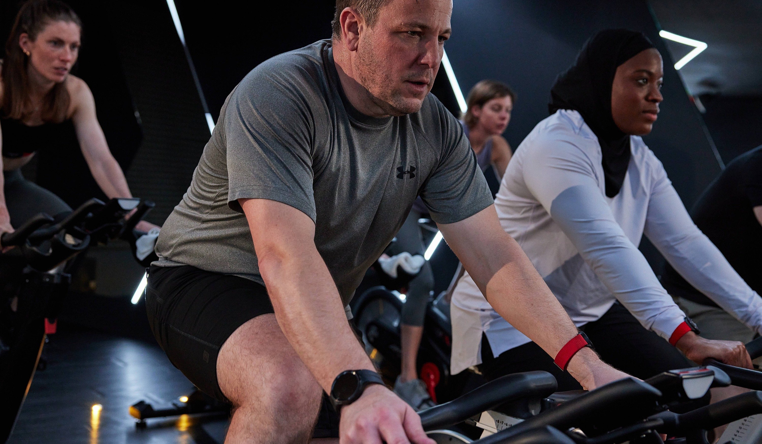 Group of Myzone users exercising in a group cycling class